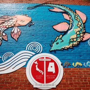 A mural on a Main Street building presents information about the Sister Cities partnership between Montevallo and Echizen, Japan.