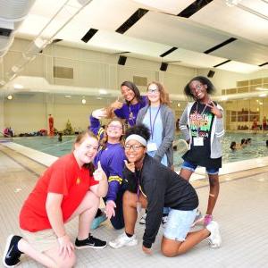 Youth from the Montevallo community pose for a photo at the Student Activity Center natatorium.